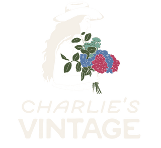 Charlie's Vintage logo, cream wordmark on transparent background, stacked format