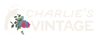 Charlie's Vintage logo, cream wordmark on transparent background, wide format